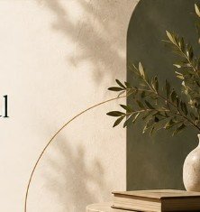 Architectural corner with olive branch in vase and books